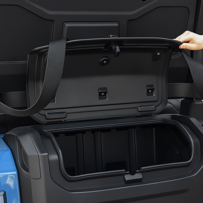 Rear floor storage and passenger footrest space